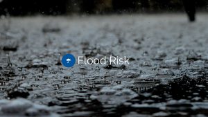 rain drops falling with flood risk text